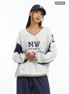 Product Detail Style : Acubi Occasion : Back to school Type : Sweat Print : Lettering Material : Cotton Sleeve : Long sleeve Neck : V neck Length : Long Fit : Loose fit Cotton100 Color : White Made in Korea Model Size Model is wearing size M/L and the color White. Height : 5'6" | 167cm / Top : S / Bottom : S (26 inch) .prddescription table, .prddescription td, .prddescription th { border : 1px solid black; border-collapse : collapse; padding: 10px; } Size(Inch) Size Shoulder Bust Sleeve Length Armhole Sleeve Width Sleeve Hem Hem Total Length M/L 24.4" 49.2" 24.2" 11.0" 9.8" 4.3" 15.6" 29.7" - The measurement can vary by 1-3 cm or 1-1.5 inches, depending on how it was measured. Size(CM) Size Shoulder Bust Sleeve Length Armhole Sleeve Width Sleeve Hem Hem Total Length M/L 62 cm 125 cm 61.5 c White T-shirt With Ribbed Cuffs For College, Oversized V-neck Sporty Sweatshirt, Casual V-neck School Sweater, Casual V-neck Sweatshirt For Streetwear, White Long Sleeve Sweatshirt With School Spirit, White Oversized Sweatshirt With School Spirit, White Oversized Varsity Sweatshirt, Oversized White Varsity Sweatshirt, Sporty Long Sleeve T-shirt For Campus