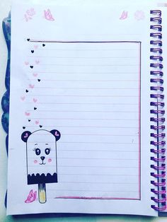 an open notebook with a panda bear on it