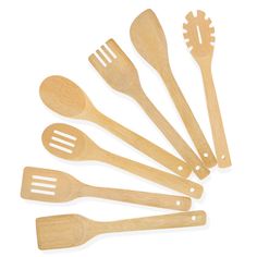 wooden utensils and spoons are arranged in a row on a white background