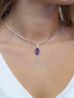 "Delicate Amethyst Choker, Facetted Amethyst Drop Pendant, Amethyst Crystal Necklace Choker, Sterling Silver. Welcome to JewelsbyGaia! ♡This dainty Amethyst necklace is beautiful enough to wear to a special event but subtle enough to wear on the daily. ♡ Crafted by hand in sterling silver. ♡ The Amethyst pendants measure ± to 1.5 cm by 1.0 cm, not including the bail (0.6 by 0.4 inches). ♡ The chain is made from sterling silver and there is 2 type's of chain available (see pictures). ♡ Necklace l Purple Teardrop Pendant Necklace For Jewelry Making, Amethyst Teardrop Pendant For Jewelry Making, Teardrop Amethyst Pendant For Jewelry Making, Purple Teardrop Pendant For Jewelry Making, Amethyst Choker, Quartz Choker, February Birthstone Necklace, Dainty Choker Necklace, Amethyst Crystal Necklace