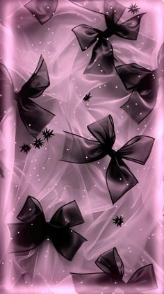 black and white bows on pink background with sparkles in the sky, as well as stars