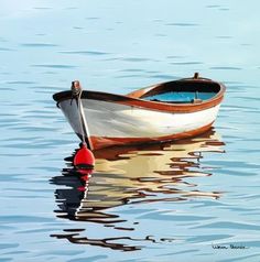 a boat floating on top of a body of water next to a red buoy