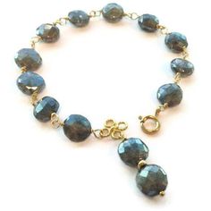 This labradorite bracelet created by Jewelry by Carmal is made of: labradorite gemstones, gold filled: wire, connector, spring ring clasp and findings. This bracelet measures 7 1/2 inches in length and has a 1 1/4 inch labradorite charm dangling from it. WE OFFER FREE STANDARD SHIPPING WITHIN THE UNITED STATES. All of our jewelry comes wrapped and ready for gift giving! All of our jewelry is unique and custom designed. Most of our jewelry can easily be resized. If there is a piece of jewelry tha Elegant Labradorite Bracelets With Natural Stones, Elegant Jewelry With Faceted Labradorite Beads, Gold Labradorite Jewelry With Faceted Beads, Hand-strung Labradorite Gold Jewelry, Elegant Labradorite Bracelets For Gifts, Elegant Gold Labradorite Bracelets, Spiritual Labradorite Bracelet, Gold Labradorite Beaded Bracelet, Spiritual Style, Gold Labradorite Bracelets With Natural Stones