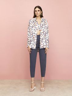 Comfy button shirt with long sleeves and cuffs. Cropped top with elastic waistband and open back.53% Rayon 47% ViscoseHand Wash Cold; Do Not Tumble Dry; Iron Low; Dry CleanDo Not Bleach. Delicate Garment; Handle With Care.Size Guide: Size Bust Waist XS 88 72 S 92 76 M 96 80 L 100 84 XL 104 88 About The Brand: NOCTURNE offers trend-led styles for women. Each collection features classic pieces updated with exciting prints, top-quality fabrics and bold silhouettes. Styles that are designed to make Brave New World, Leopard Spots, Twin Set, Independent Designers Fashion, Button Shirt, Cropped Top, Size Guide, Quality Fabric, Unique Style