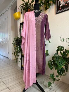 Purple dress:  Tissue silk 3 piece set with embroidery at yoke, hands and bottom Pallazo pant Size: 40inch length of the top: 43inch Silk Salwar Kameez With Dupatta, Straight Kurta, Purple Chinon Salwar Kameez With Traditional Drape, Unstitched Straight Kurta Suit With Sheer Dupatta In Chinon, Unstitched Silk Churidar With Mirror Work, Traditional Drape Silk Salwar Kameez With Mirror Work, Silk Salwar Kameez With Sheer Dupatta, Silk Salwar Kameez With Sheer Dupatta In Traditional Drape, Silk Salwar Kameez With Mirror Work In Traditional Drape, Traditional Silk Salwar Kameez With Mirror Work