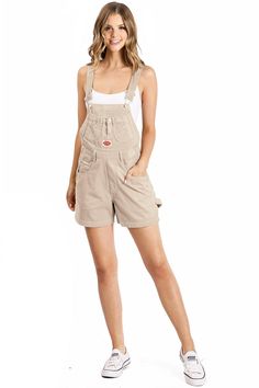 Vintage shortalls for those looking for a one of a kind throw me back, nostalgia good old days outfit.  Clasp closures with adjustable straps, large bib front pocket, has mini compartments and buttons on the side.   SMALL: Waist: 26" | Hips: 38" MEDIUM: Waist: 28" | Hip: 40"   LARGE: Waist: 30" | Hip: 42" Model is 5'8 and wearing a size Small Measurements | 30" or 76 cm Top to Bottom 3.5" or 9 cm Inseam [Measured on a size Small] Material | 100% Cotton (Non-Stretchy Canvas/Denim) Care Instructions | Machine Wash or Hand Wash Cold  SMALL CUSTOMER REVIEWS 1. I'm 5'4 about 120 pounds and I ordered a small in the navy. They fit perfectly! I would recommend getting the size you usually wear. The fabric and stitching feel high quality. 2. The overalls are just great! Exactly what I pictured. The Utility Overalls With Patch Pockets And Bib Front, Utility Overalls With Patch Pockets, Utility Cotton Overalls With Pockets, Utility Jumpsuit With Bib Front And Pockets, Utility Jumpsuits And Rompers With Bib Front And Pockets, Utility Overalls With Side Pockets And Bib Front, Utility Cotton Shortalls With Side Pockets, Cotton Utility Shortalls With Side Pockets, Utility Cotton Overalls With Adjustable Straps