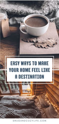 a cup of coffee sitting on top of a wooden table next to a book with the words easy ways to make your home feel like a destination