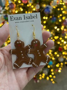 A super cute statement earring perfect for the holidays. Made from clay making them super lightweight. Gold hooks. Dress them up or down.  All of my earrings are hand-cut & assembled by me. So you may see slight variations in the color and/or pattern on each earring.  Also, most earrings have a video clip on Instagram:@evanisabel2020 and you can also see what's coming up, being added, and behind the scenes creating of earrings. All orders over $35.00 ship FREE Polymer Clay Gingerbread Man, Clay Gingerbread Man, Polymer Clay Gingerbread, Clay Gingerbread, Clay Making, Gold Hooks, How To Make Clay, Statement Earring, Etsy Earrings Dangle