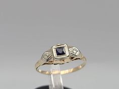 Vintage Art Deco 14k Gold French Cut Synthetic Blue Stone and Diamond Ring Size 6.75 Item w#1658 Clean and in good condition  .16 carat French Cut Synthetic Blue Stone .02 carat Genuine natural Diamonds Color H-I Clarity SI2 1.3 grams Ring can be sized by your local jeweler Marked 14k Welcome to Westgate Jewels!! We specialize in vintage estate, designer, and fine jewelry. Our shop consists of items that are estate, antique, and / or vintage conditions unless otherwise noted. This means that mos Art Deco Yellow Gold Sapphire Ring For Gift, Art Deco Yellow Gold Birthstone Rings, Blue Art Deco Jewelry Stamped 14k, Art Deco Sapphire Ring Stamped 14k As A Gift, Gold Art Deco Ring, Vintage Native American Jewelry, Vintage Designer Jewelry, French Cut, Gold Art Deco