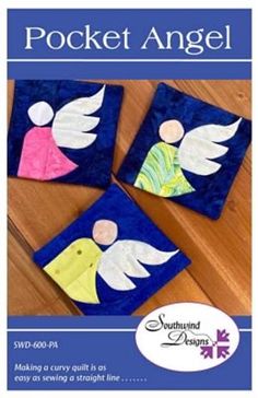 three quilted angel coasters sitting on top of a wooden table