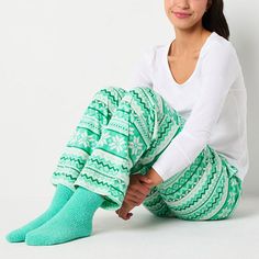 These women's plaid pajama pants by Sleep Chic are perfect to mix in to your sleepwear rotation during the colder months. Made from soft fleece, this pair includes an elastic waist, side slip pockets and comes complete with a pair of matching socks. Included: 1 Pair(s) of SocksClosure Type: Full ElasticPockets: 2 Side Slip PocketsApparel Length: 41.3 InchesFiber Content: 100% PolyesterFabric Description: FleeceInseam: 31 InCare: Machine Wash, Tumble DryCountry of Origin: Imported Printed Pajama, Plaid Pajama, Fleece Pajama Pants, Matching Socks, Plaid Pajama Pants, Fluffy Socks, Womens Fleece, Pajama Top, Pajama Pants