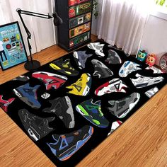 there is a rug with many shoes on it