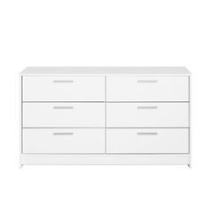 a white dresser with four drawers and two doors