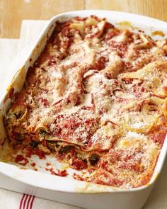 a casserole dish filled with pasta and sauce