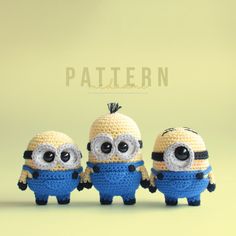 three crocheted minion dolls are standing in front of a green background with the word pattern written across it