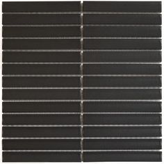 black glass tile with white lines on the bottom and bottom part, in an angled pattern