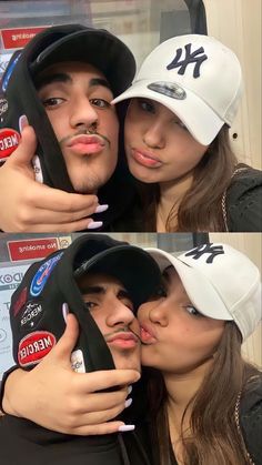 two people with hats on their heads are posing for the camera and kissing each other