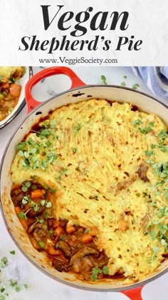 an omelet with meat and vegetables in a red skillet on a white table