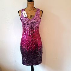 This Is A Nwt Pretty Guide Sequin Dress. It Is A Womens Size L And Has Light Pink To Dark Pink To Dark Purple Ombre From Top To Bottom. It Has Stretch And Is Ideal For Size 6 To 10. 35" From Top To Bottom Hem, Mid Thigh Length. Purple Polyester Lining Throughout. Purple Sequined V-neck Dress, Purple Sleeveless Mini Dress For Party Season, Purple V-neck Dress For Party Season, Pink Sequined Knee-length Mini Dress, Glamorous Purple Sleeveless Mini Dress, Lavender Knee-length Party Dress, Purple Sleeveless Dress For Party Season, Mauve Knee-length Party Dress, Purple Knee-length Cocktail Mini Dress