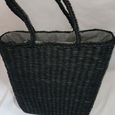 This Woven Straw Tote From Old Navy Is The Perfect Beach Bag! Cute Gingham Blue And White Print Cloth Lining On Inside, One Inside Pocket. Excellent Condition. Never Used. A Couple Of Loose Spots, Pictured. Opening Is Approximately 13.5" Across, Stretches To Approximately 7" Depth. Exterior Is Approximately 14" Wide At Top, Tapers To 10" At Bottom, Straps Are 9" Tall, Making This The Perfect Shoulder Bag For Your Beach Day! Color As Pictured, Appears Black Or A Very Dark Blue. Black Woven Handheld Shoulder Bag, Elegant Black Beach Bag For Everyday, Elegant Black Beach Bag, Eco-friendly Black Shoulder Bag With Double Handle, Black Casual Straw Bag, Black Casual Straw Tote Bag, Eco-friendly Black Bags With Braided Handles, Casual Black Straw Tote Bag, Elegant Black Shoulder Bag For Beach