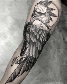 a black and white photo of a bird with wings on it's arm, done by