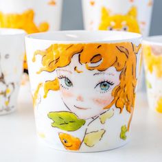 🌿 "Golden Dreams" - Hand-Painted Nature-Inspired Ceramic Mug 🌿 Immerse yourself in the serene beauty of nature with our "Golden Dreams" ceramic mug. This delicately hand-painted masterpiece features a captivating design of a vibrant, golden-haired figure, surrounded by playful koi fish and soft green leaves. The gentle brushstrokes bring the natural world to life, creating a calming and elegant addition to your daily tea or coffee ritual. 🌸 Unique Hand-Painted Artistry: Each "Golden Dreams" m Whimsical Mugs Coffee Cups, Koi Fish Mug, Koi Fish Tea Set, Mermaid Pottery Mug, Dream Water, Tiger Mug Ceramics, Golden Fish, Carpe Koi, Non Toxic Paint