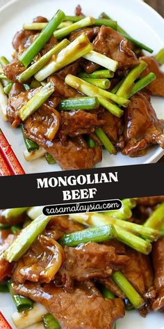 beef and asparagus stir fry on a white plate with the words, monopolian beef