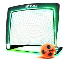 an orange soccer ball sitting in front of a net with the net play logo on it