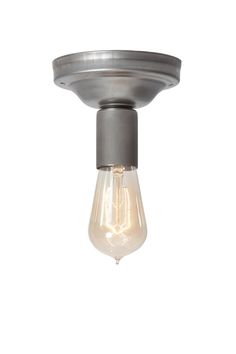 a light that is on top of a metal fixture with a bulb attached to it