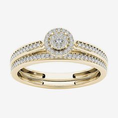 a yellow gold wedding ring set with diamonds