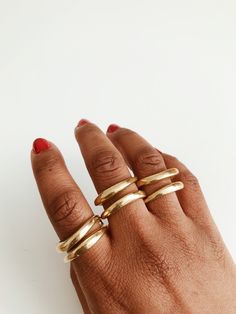 A simple yet beautiful, lightly textured, double sculpted adjustable ring. Pairs perfectly with any of our rings and bracelets. DETAILS: Solid Brass Adjustable Ring Ships with polishing cloth to keep it forever shining. Packaged for gift giving. *Sold individually, not a set. Return to shop: Afrohemien.etsy.com Like and Follow Afrohemien for updates, sales, coupons and surprise giveaways Instagram/Blog: instagram.com/Afrohemien Tumblr: Afrohemien.tumblr.com Facebook: www.facebook.com/Afrohemien Adjustable Gold Wide Band Ring For Everyday, Minimalist Hand Cast Ring, Adjustable Thick Band Metal Stackable Rings, Adjustable Open Dome Ring For Everyday Wear, Everyday Metal Midi Rings With Open Design, Adjustable Open Band Jewelry For Everyday, Adjustable Thick Band Stackable Wide Ring, Adjustable Open Dome Ring For Everyday, Hand Cast Minimalist Round Jewelry