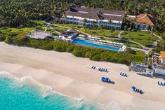 an aerial view of the house and beach