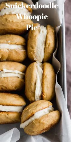 a box filled with cookies covered in frosting