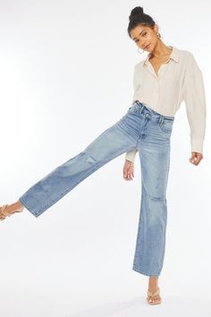 These jeans bring back the timeless charm of wide leg straight jeans with a modern twist. The light stone wash gives them a vintage-inspired look, while the rigid denim ensures authenticity. The slight cross-over front waistband adds a unique touch, and the hidden button closures provide a clean and sleek appearance. With knee distress for a touch of edge and a zip fly for easy wear, these jeans offer both style and comfort for a versatile and trendy wardrobe addition. Style: 90s Vintage Print / Pattern: Light Stone Wash Silhouette: Wide Straight Jeans Fit: Relaxed Embellishment: Knee Distress Neck Line: NA Sleeve: NA Length: Long Closure: Zip Fly Lining: No Fabric Contents: 100% Cotton Stretch fabric Non-sheer fabric Care Instructions: Machine wash cold, gentle cycle, tumble dry low. Size 90s Fits, Straight Leg Denim, Jeans Light, Jeans Online, China Fashion, Sleek Look, Bring Back, Everyday Wardrobe, Sheer Fabrics