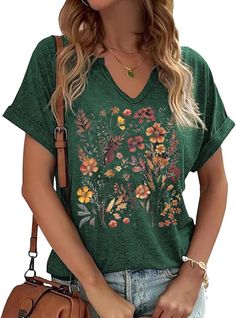 PRICES MAY VARY. Womens Boho Flower T Shirt;V Neck Flower Shirt;Vintage Flowers Printed Shirt;Floral Graphic Tee;Wildflower T-shirt Features: Cotton Blend. High quality, light weight, lasting durability, fabric soft and comfortable, V Neck Graphic Tee. Occasion: This shirt is versatile and can be worn for casual outings, streetwear, office attire, home wear, school, daily wear, vacations, and special holidays such as Mothers Day and Summer. Can Match Wih Kinds Of Bottoms Like Shorts, Jeans, Loos V Neck Graphic Tee, Flower Graphic Tee, Streetwear Office, Flower T Shirt, Neck Flower, Flower Print Shirt, Vintage Flower Prints, Cottage Core Aesthetic, Floral Graphic