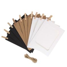 PRICES MAY VARY. High quality kraft paper photo frames,white/black/brown three colors mixed randomly. Portable photo frame, easy to use, replacement, collocation, DIY, no constraints. Set comes with: 30 frames, 30 mini wooden clips,2 meter(6.5ft) hemp ropes x 3. Overall size: 7.28" x 5.31", inner size(display area): 5.31" x 3.62",fit 5" x 7" pictures/photos. Perfect for wall decoration, suited for home, classroom, office, bar, hotel, corridor and more. Photo frames made of high quality kraft pap Picture Garland, Cardboard Photo Frame, Photo String, Graduation Party Photo Booth, Wall Hanging Photo Frames, Paper Picture Frames, Greeting Card Display, Picture Album, Rustic Pictures