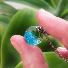 "A magical Resin Orb has beautiful \"Fairy\" Bubbles inside. Each Ball is filled with iridescent Bubbles which when held to the light reflect a few different colors. ❋The ball is 1.5 cm (0.6 inch) diameter ❋Necklace comes with a hypoallergenic Stainless Steel chain. Please choose the chain size when buying. ❋Every piece in this shop was made in several casting steps, sanded and polished by hand. ❋Please note that colours and patterns of each piece may vary slightly as it is unique and individually hand-crafted. Please also allow for  minor imperfections due to handcrafting process and material used. ❋Each finished jewelry listing will arrive ready to gift in a gift box ❋Any questions please feel free to ask :)" Silver Fairycore Crystal Necklace Gift, Gift Iridescent Crystal Necklace With Round Beads, Magical Silver Resin Jewelry, Mystical Crystal Necklaces With Round Beads For Gifts, Silver Resin Jewelry With Magical Style, Mystical Crystal Necklace With Round Beads For Gift, Handmade Fantasy Crystal Necklace For Gifts, Magical Iridescent Necklace Gift, Magical Resin Necklace For Gifts