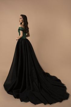 Step into a world of timeless elegance with our "Emerald Gothic Off-Shoulder Wedding Dress," a masterpiece designed for the modern woman who embraces classic sophistication with a touch of dramatic flair. This enchanting gown captivates with its luxurious sequined corset, casting a dazzling array of light with every movement. The off-shoulder design exudes a romantic charm, showcasing a delicate balance of allure and modesty, while the rich emerald hue sets a unique and unforgettable statement.T Floor Touch Gown, Evening Gown Plus Size, Tulle Evening Gown, Black Lace Prom Dress, Off Shoulder Wedding Dress, Dark Green Dress, Gown Plus Size, Belle Dress, Lace Prom Dress