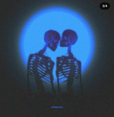 two skeletons standing next to each other in front of a blue background with the words, love