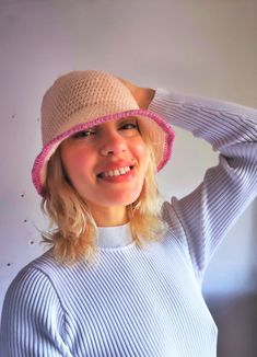 Handmade crochet bucket hat in acrylic yarn in beige color with pink stripe. Comfy and keeps warm. Product size: 54-56см head girth.  Before ordering, please make sure that this item is the right size for you. Color: beige, pink( color discrepancies may occur due to different screen settings). Gender: unisex. Suitable for seasons: warm winter, spring and autumn. Material: acrylic yarn. Product care- machine washable, cool wash-30o, do not iron, do not tumble dry, do not chloride bleach, dry clean. Pink Brimmed Bucket Hat For Winter, Pink Winter Bucket Hat With Short Brim, Pink Hand Knitted Crochet Cap, Pink Hand-knitted Crochet Cap, Hand-knitted Pink Crochet Cap, Pink Crochet Yarn Cap, Pink Crochet Yarn Hat, Pink Wide Brim Yarn Sun Hat, Pink Wide Brim Crochet Hat For Winter