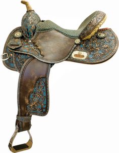 a brown and blue saddle with a bird on it