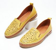 These leather slip-ons boast an intricately designed, perforated upper that demands attention. Whether you choose to wear them with your go-to jeans, a cute maxi dress, or shorts during those warm summer months, they're destined to radiate your sense of style for all to enjoy. From Spring Step. Leather Slip-ons With Woven Sole For Summer, Leather Slip-ons With Woven Sole For Spring, Comfortable Leather Slip-ons For Spring, Spring Flat Heel Slip-ons With Perforations, Spring Leather Slip-ons With Textured Sole, Summer Leather Slip-ons With Perforations, Leather Slip-ons With Perforations For Summer, Spring Slip-ons With Perforations And Flat Heel, Spring Perforated Flat Heel Slip-ons