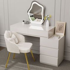 a white desk with a chair and mirror