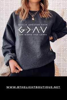 Dark heather grey unisex crewneck sweatshirt with the symbols that represent God is greater than the highs and lows in bold large font centered between the phrase "God is Greater than" above the symbols and "the highs and lows" below the symbols God Is Greater Than The Highs And Lows Jewelry, God Is Greater Than The Highs And Lows Svg, God Is Greater Than The Highs And Lows Sweatshirt, Christian Sweaters For Women, Bible Verse Sweatshirts, Christian Sweatshirts, Faith Messages, Christian Clothes, Aesthetic Christian