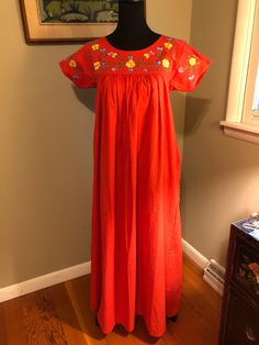 I am offering a 1970s Bloomingdales red cotton peasant dress. This dress has a floral embroidered yoke with gussets and short sleeves. The body of the dress is gathered and is floor length. It is marked as a size small. Measurements on request. Leather Key Case, Peasant Dress, Modest Dresses, Floor Length, 1970s, The Dress, Dress Outfits, Sewing Crafts, Short Sleeves