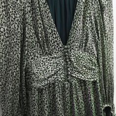 Ba&sh 'Celie' full-length dress in metallic gold and green leopard print with a plunging v-neck, button details at the waist, and balloon sleeves with bracelet cuffs. Brand = Ba&sh Condition = 8/10, gently worn Size = XS US Material = 55% Polyester, 45% Metallic Fibres SKU = 14396-45 Elegant Leopard Print Maxi Dress For Parties, Elegant Leopard Print Maxi Dress For Evening, Elegant Leopard Print Maxi Dress For Date Night, Elegant Leopard Print Formal Dress, Leopard Print V-neck Evening Dress, Elegant Leopard Print Midi Dress For Evening, Elegant Leopard Print V-neck Midi Dress, Fall Party Maxi Dress In Leopard Print, Leopard Print Maxi Dress For Fall Party