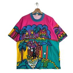 Check out this item in my Etsy shop https://www.etsy.com/listing/1439160119/vintage-planet-kool-polo-team-all-over Multicolor Graffiti Print Crew Neck T-shirt, Multicolor Graphic Print Crew Neck T-shirt, Multicolor Crew Neck T-shirt With Graffiti Print, Graphic Tee Multicolor Tops For Streetwear, Multicolor Streetwear Tops With Screen Print, Multicolor Relaxed Fit Tops For Streetwear, Multicolor Screen Print Tops For Streetwear, Multicolor Graphic Print Top For Streetwear, Oversized Multicolor Top For Streetwear