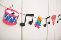 musical notes are hanging on the wall