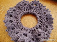 there is a crocheted circle on the table