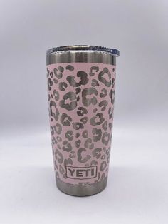 the yeti tumbler is pink with leopard print